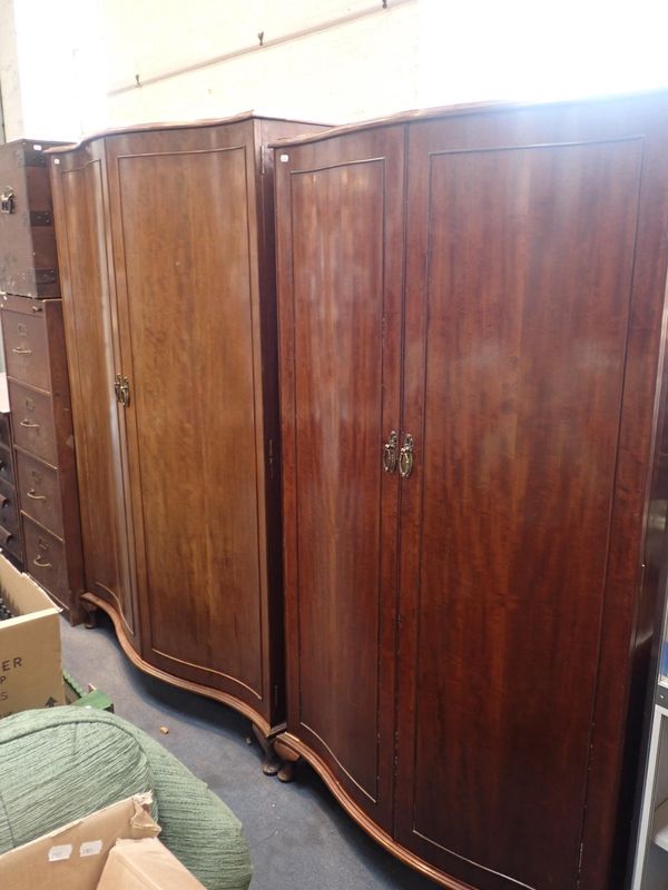A PAIR OF MAHOGANY SERPENTINE FRONTED WARDROBES