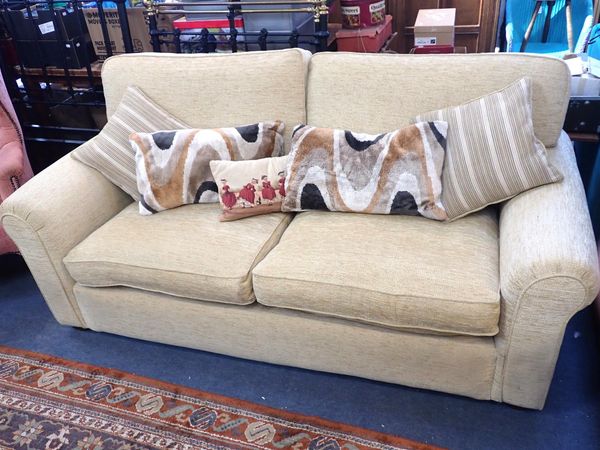 A PARKER KNOLL TWO SEATER SOFA