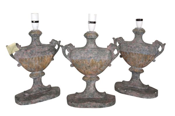 THREE MOTTLED GREY-PAINTED PLASTER URN SHAPE ELECTRIC TABLE LAMPS