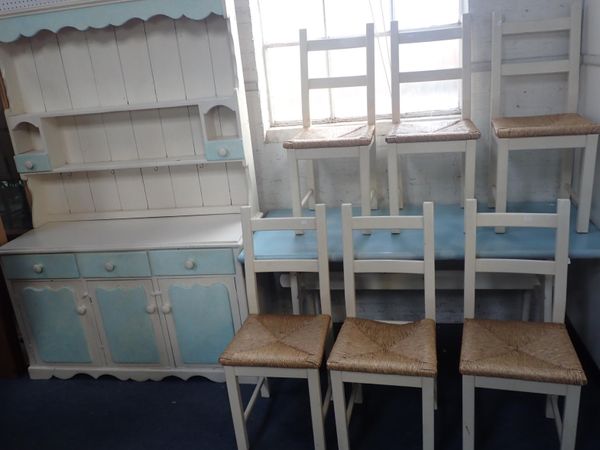 A PAINTED KITCHEN TABLE AND SIX CHAIRS