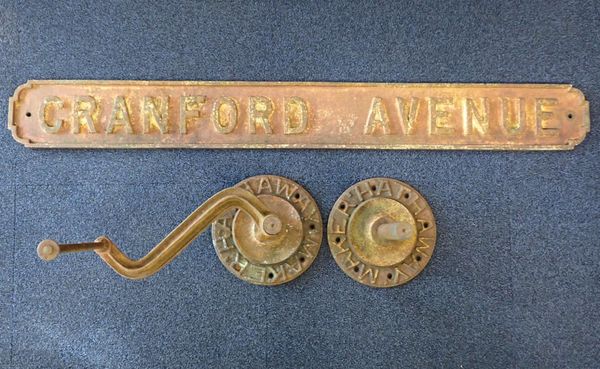 A CAST IRON STREET SIGN; 'CRANFORD AVENUE'