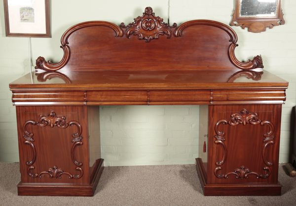 A VICTORIAN MAHOGANY PEDESTAL SIDEBOARD