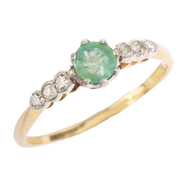 AN EMERALD AND DIAMOND RING
