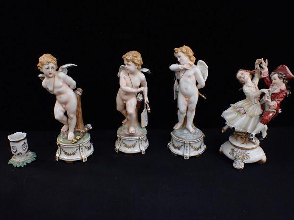THREE CAPODIMONTE WINGED CUPIDS