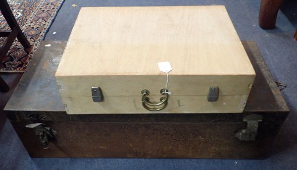 A LARGE TIN TRUNK