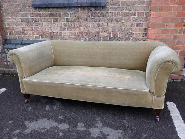 AN EDWARDIAN DROP-END SOFA