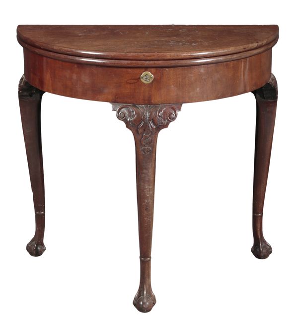AN EARLY GEORGE III MAHOGANY DEMI-LUNE TEA TABLE OF IRISH DESIGN
