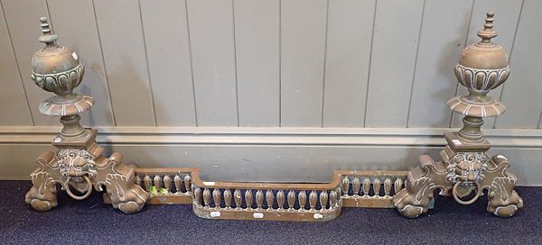 A BRASS ADJUSTABLE FENDER, IN THE BAROQUE TASTE