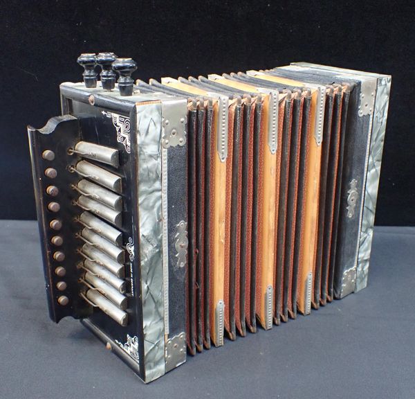 A VINTAGE GERMAN MADE ACCORDION