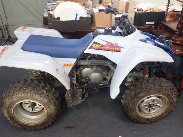 A YAMAHA WOLVERINE 350 4 X 4 QUAD BIKE