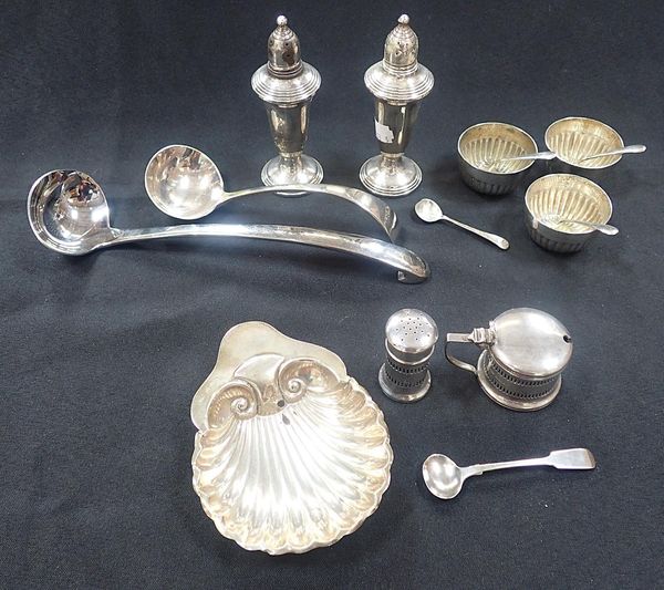 A SILVER SHELL DISH, A SILVER PEPPER, MUSTARD AND SPOON