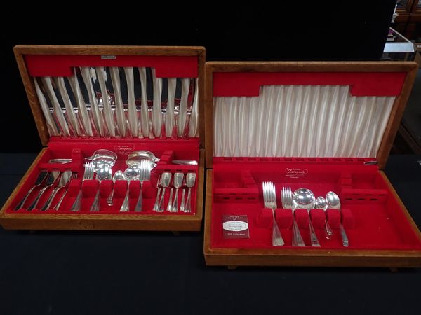 TWO CANTEENS OF SILVER-PLATED CUTLERY