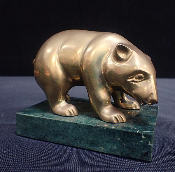 AN ART DECO STYLE BRASS FIGURE OF A BEAR