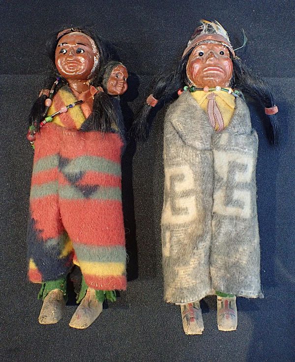 A PAIR OF 'NATIVE AMERICAN INDIAN' DOLLS
