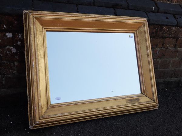 A GILTWOOD FRAMED MIRROR