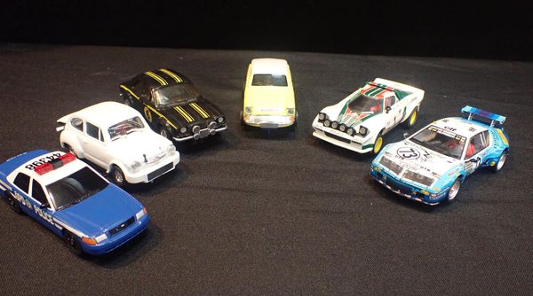 SIX UNBOXED SCALEXTRIC CARS