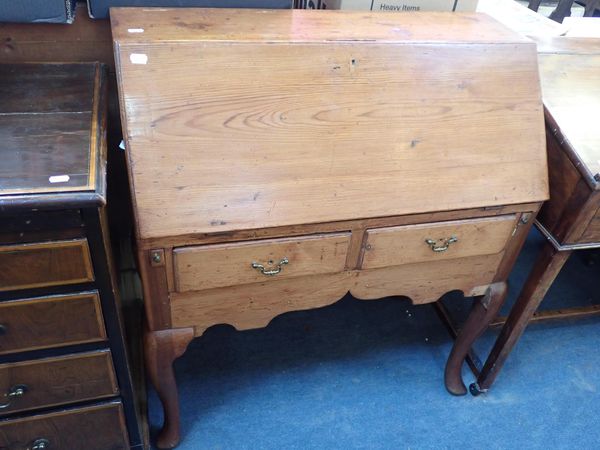 A GEORGE III STRIPPED PINE BUREAU