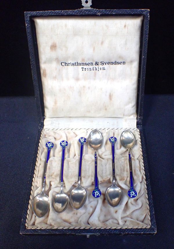 A SET OF SILVER ENAMELLED SPOONS