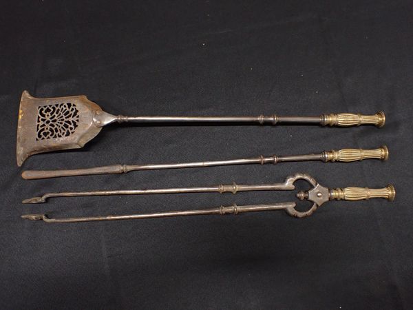 A SET OF 19th CENTURY STEEL AND BRASS FIRE TOOLS