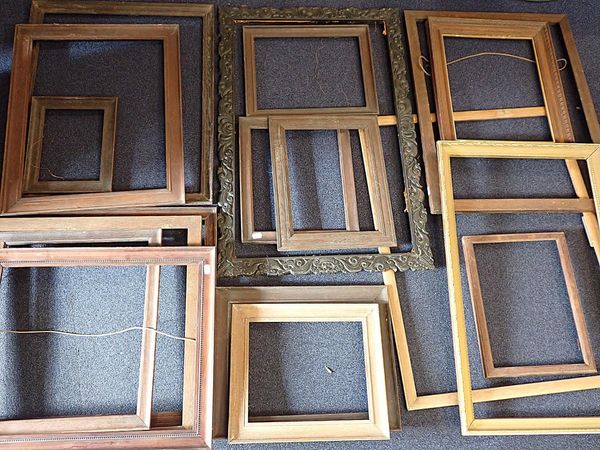 A CHINESE CARVED HARDWOOD PICTURE FRAME