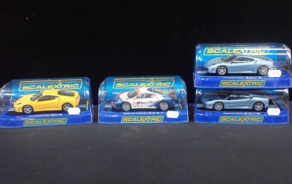 FOUR BOXED SCALEXTIC 'FERRARI F430' CARS