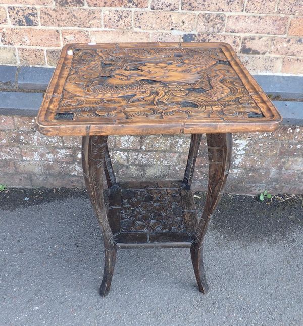 A LIBERTY STYLE JAPANESE CARVED TABLE