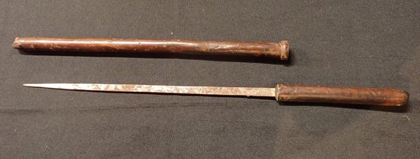 A LEATHER-COVERED SWAGGER/DAGGER STICK
