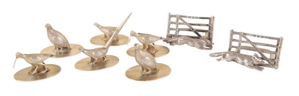 A SET OF SIX GEORGE V SILVER GAME BIRD MENU HOLDERS