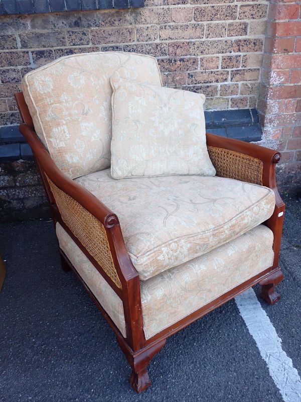 A 1920s MAHOGANY BERGERE ARMCHAIR