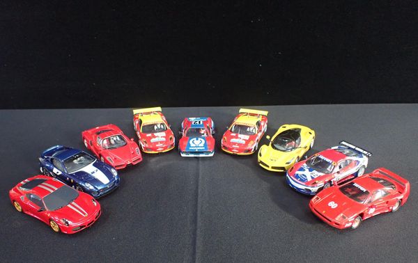 NINE UNBOXED SCALEXTRIC 'FERRARI' CARS