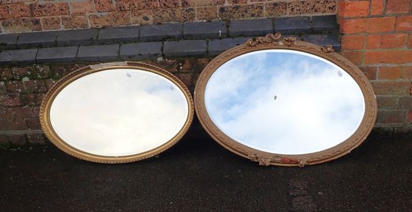 TWO GILT-FRAMED MIRRORS WITH BEVELLED PLATES