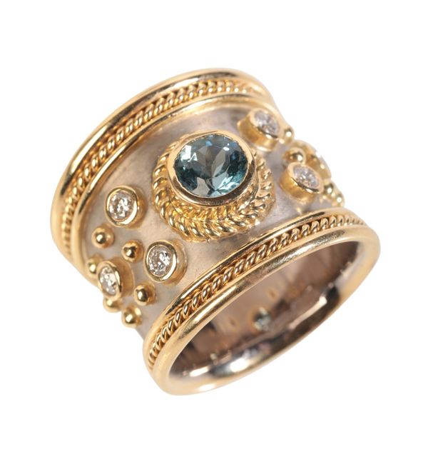 AN AQUAMARINE AND DIAMOND ETRUSCAN STYLE RING