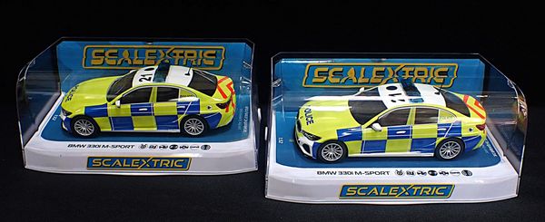 TWO BOXED SCALEXTRIC 'POLICE' CARS