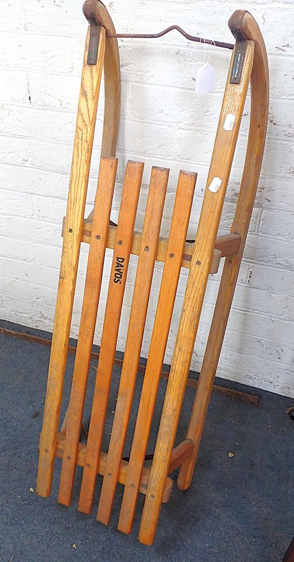 A WOODEN SLEDGE