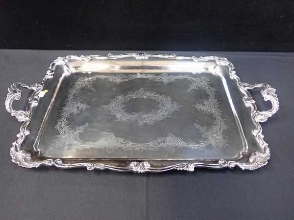 A VICTORIAN SILVER PLATED TWO HANDLED TRAY