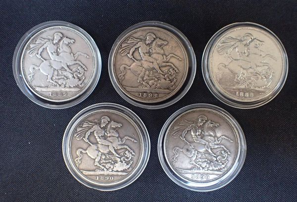 FIVE VICTORIAN SILVER CROWNS