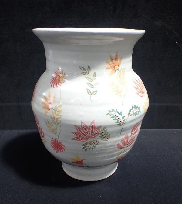 A LARGE HAND POTTED VASE