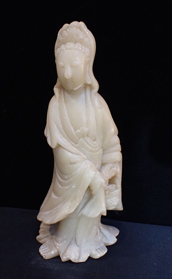 A CHINESE SOAPSTONE FIGURE OF GUANYIN
