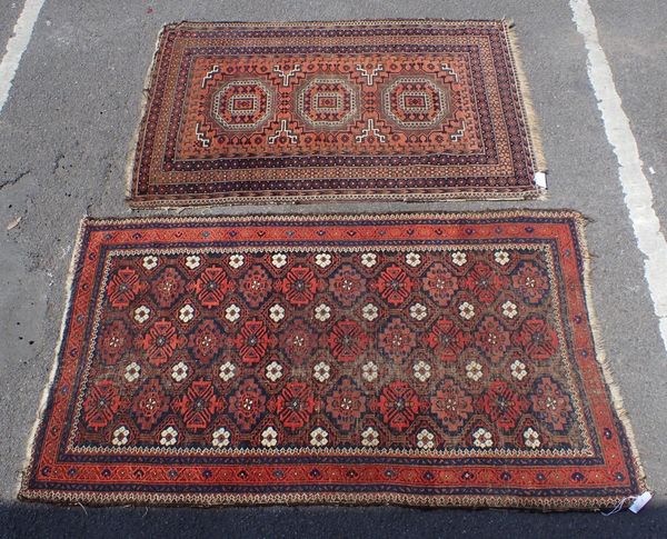 TWO ANTIQUE  BELOUCHISTAN RUGS