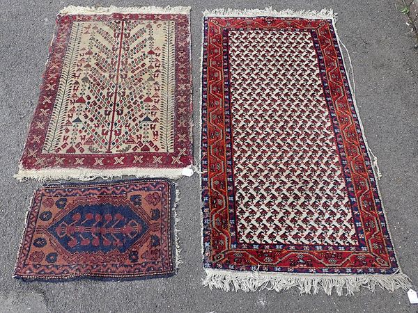 THREE RUGS