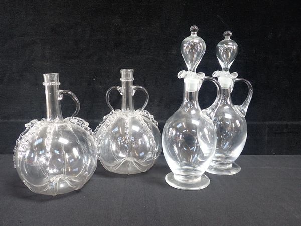 PAIR OF DUTCH TRAILED GLASS DOUBLE HANDLED DECANTERS