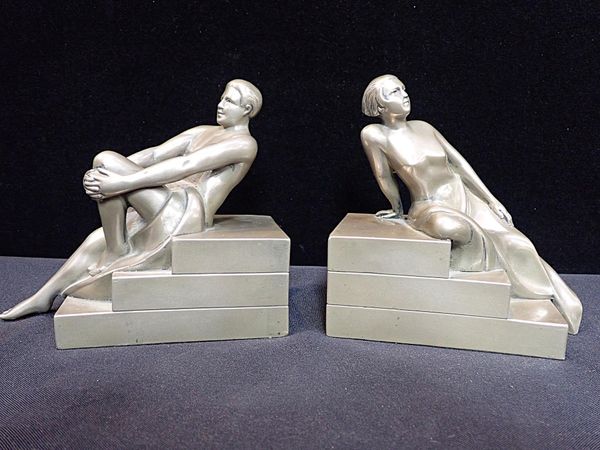 A PAIR OF FRENCH ART DECO FIGURAL BOOK ENDS