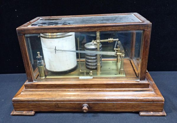 AN OAK CASED BAROGRAPH