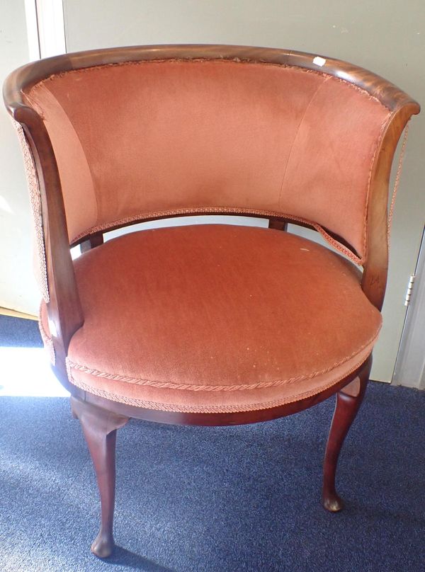 AN EDWARDIAN MAHOGANY FRAMED TUB ARMCHAIR