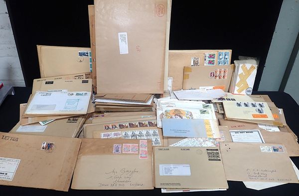 A COLLECTION OF ENVELOPES OF STAMPS