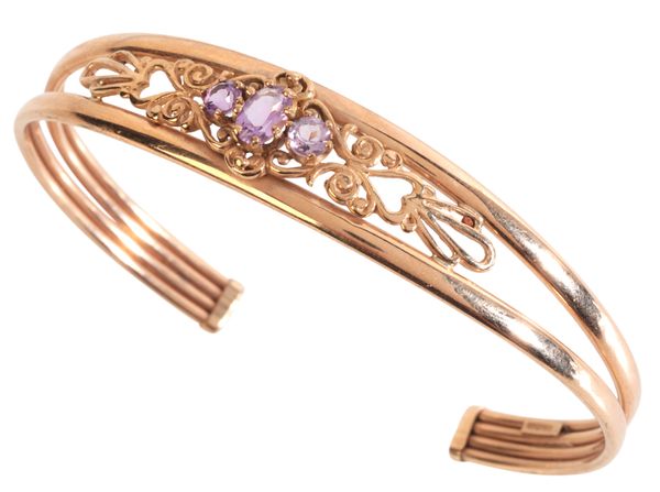 A PINK SAPPHIRE CUFF BANGLE