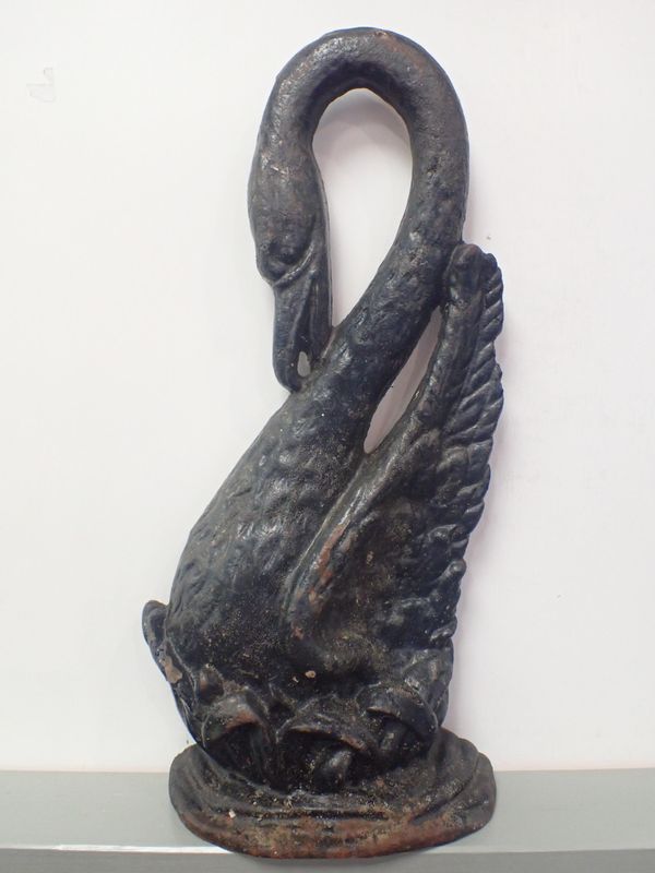 A CAST IRON SWAN DOORSTOP