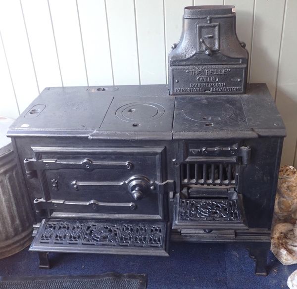 A CAST IRON KITCHEN RANGE 'THE BELLE'