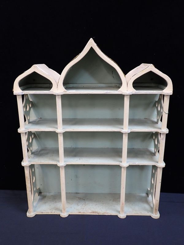 A SET OF REGENCY STYLE PAINTED WALL SHELVES