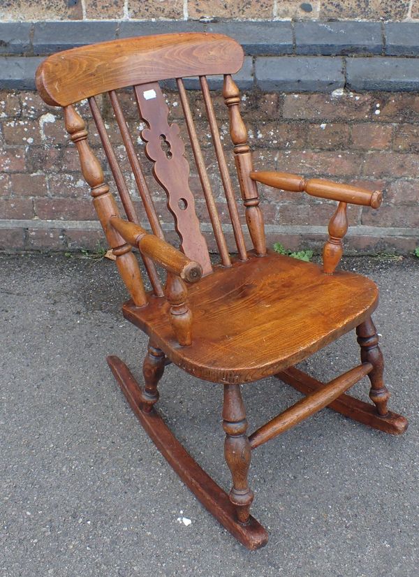 A CHILD'S WINDSOR ROCKING CHAIR